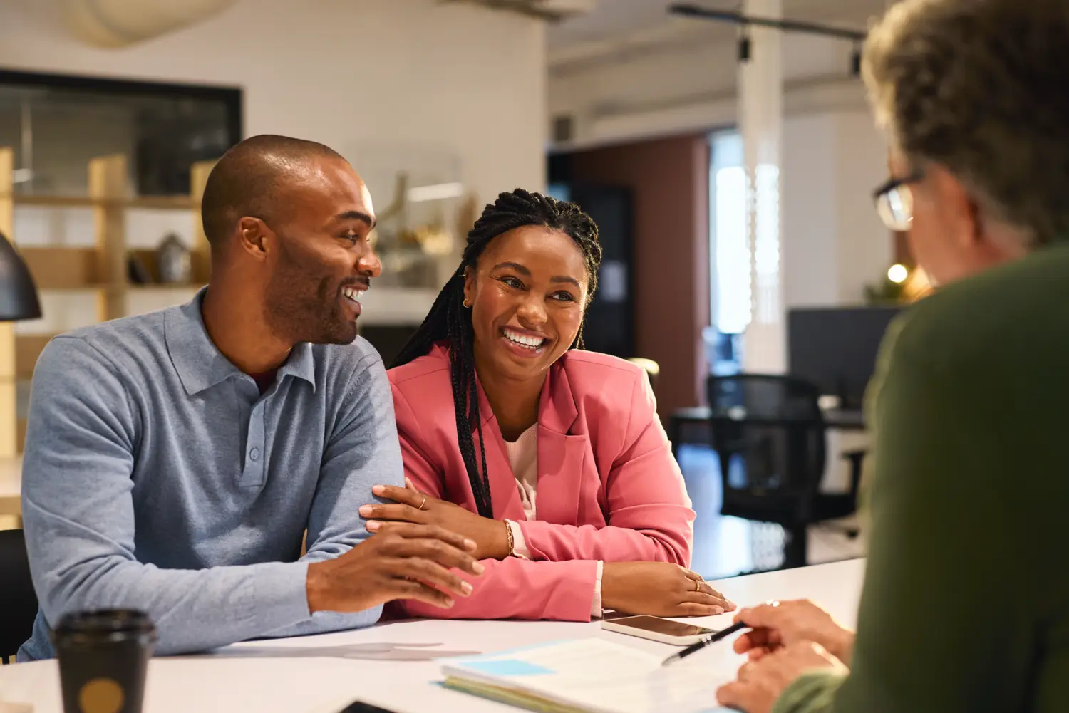 Couple meeting financial advisor for investment